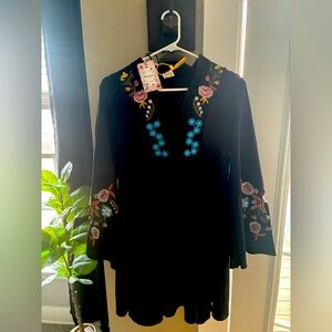 Embroidered baby doll dress never worn